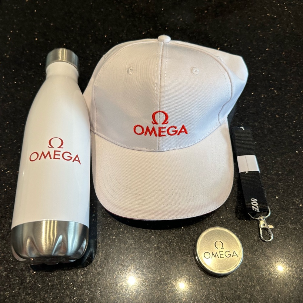 Omega Watch Brand X Taylor Made shoe bag with 007 Omega Lanyard, bottle and mint